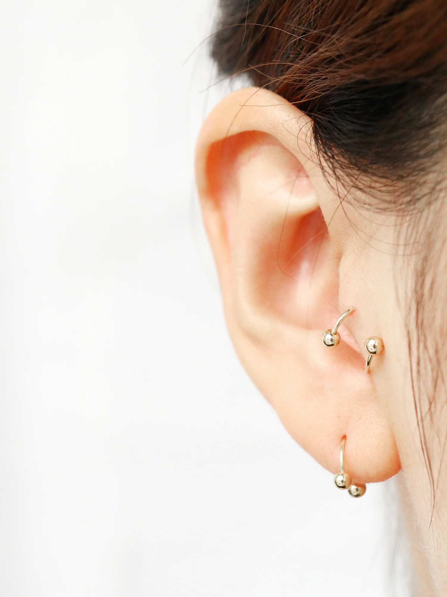 14K Gold Twist & Horseshoe Cartilage Earring 20G - Image 6